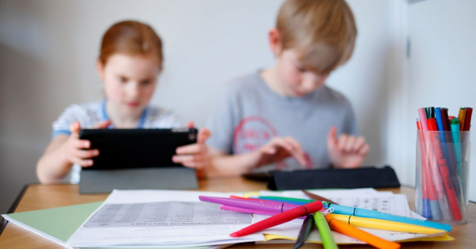 Children doing virtual schoolwork