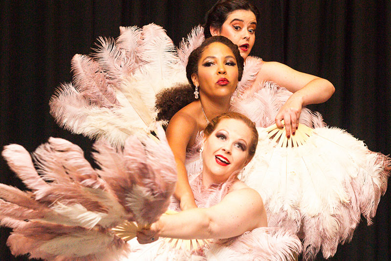 A photo of three burlesque dancers at Bubbles & Burlesque at the Sexual Freedom Summit.