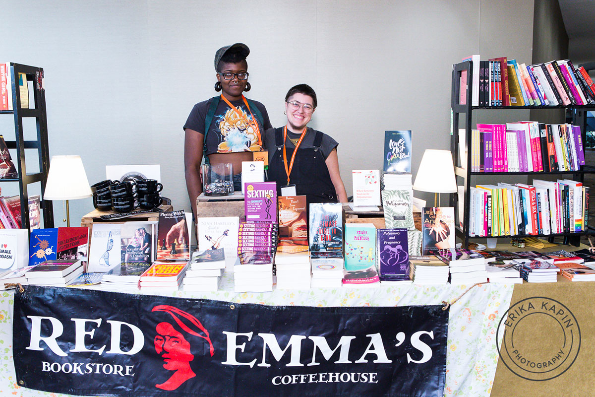 Photo of Red Emma's Booksellers at their booth in 2018