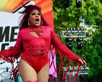 A photo of a drag queen performing.