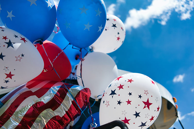 Photo of the American Flag & Balloons