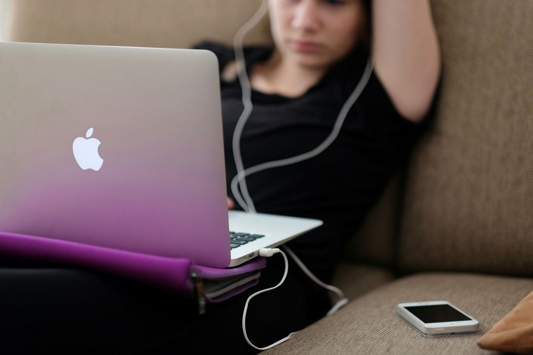 Photo of person with laptop