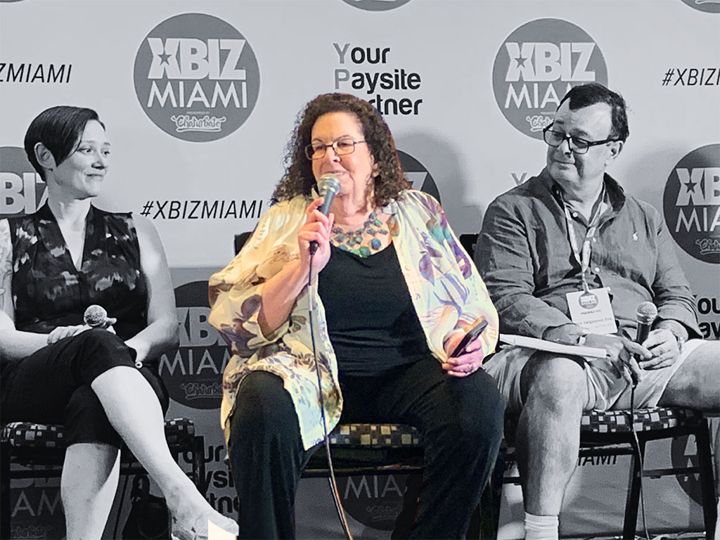 Photo Ricci Levy speaking on a panel.